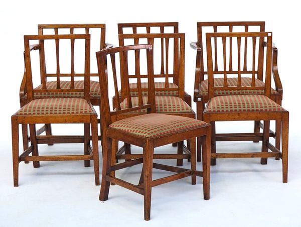 A set of eight George III fruitwood framed square stick back armchairs