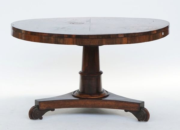 A Regency rosewood circular snap top centre table