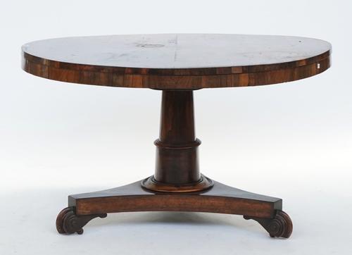 A Regency rosewood circular snap top centre table