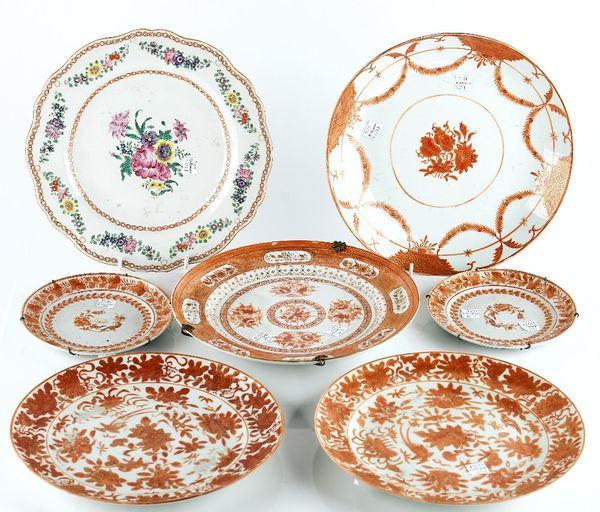 Six pieces of Chinese iron-red and gilt porcelains and a famille-rose export plate