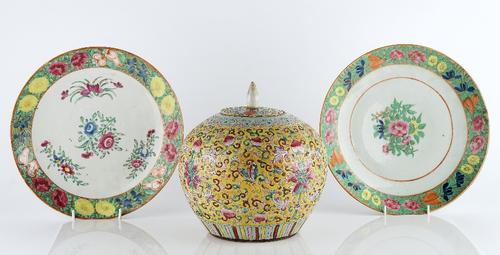 A Chinese yellow- ground famille-rose jar and a cover