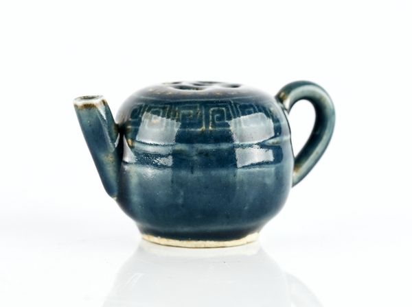AN UNUSUAL CHINESE SMALL BLUE GLAZED WATER DROPPER