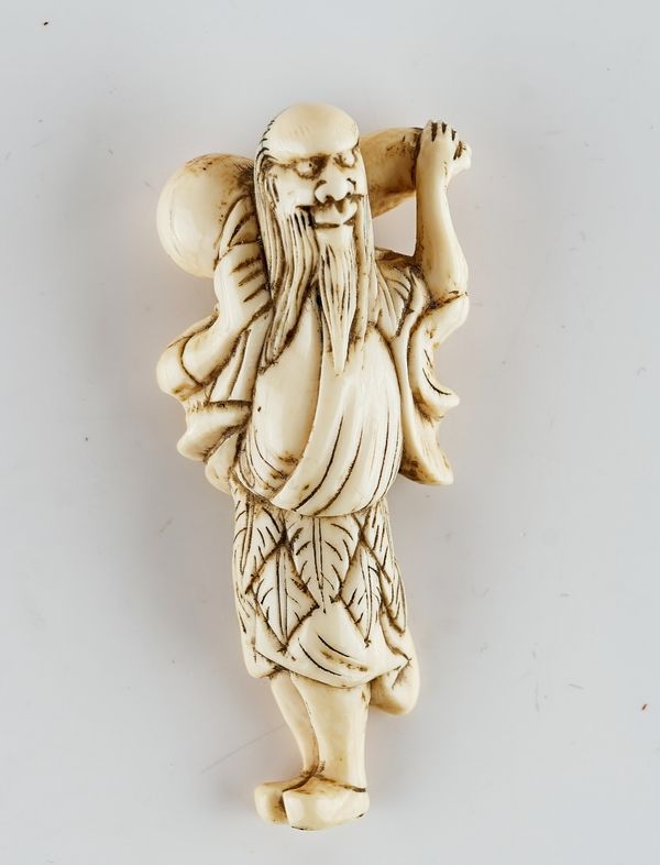 A Japanese ivory netsuke of a sennin