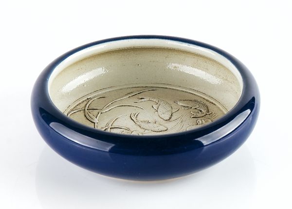 A Chinese stoneware shallow bowl