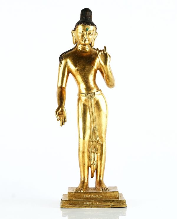 A Nepalese gilt bronze figure of Buddha