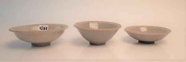 Three Chinese stoneware monochrome glazed bowls