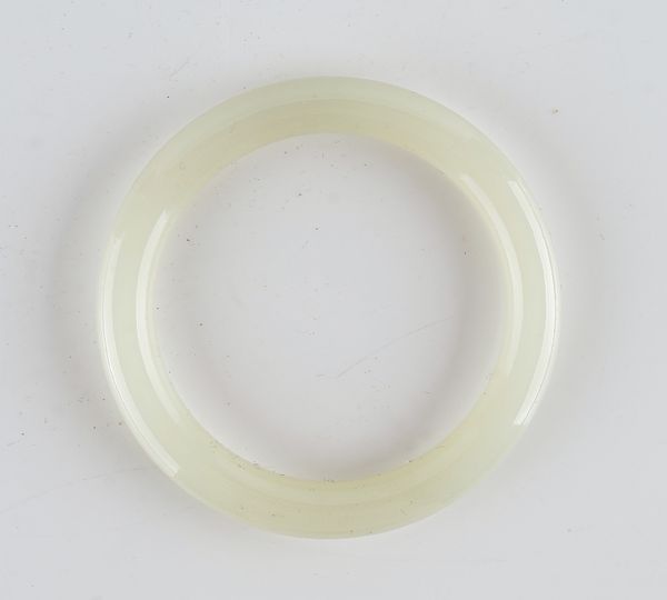 A Chinese white jade bangle