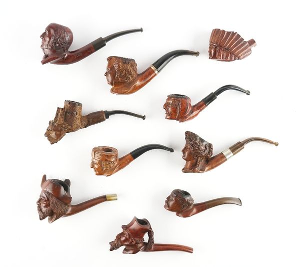 TEN CARVED WOOD FIGURAL PIPES (10)