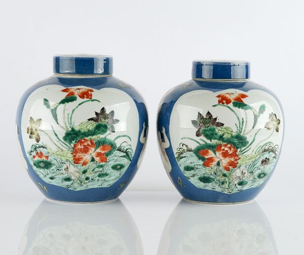 A pair of unusual Chinese porcelain ginger jars and covers