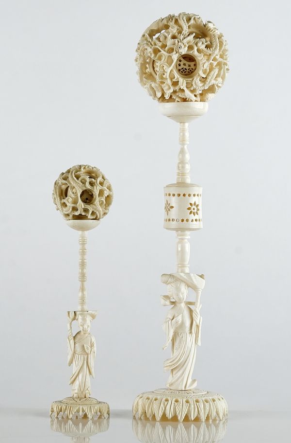 Two Chinese ivory concentric balls on stands