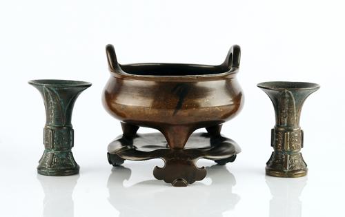 A CHINESE BRONZE TRIPOD CENSER AND STAND