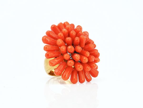 A coral brooch converted to a ring