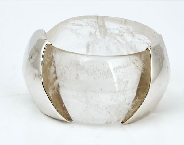 A silver mounted rock crystal bangle