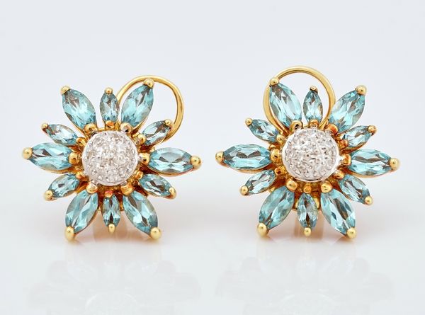 A pair of gold, blue topaz and diamond set earstuds