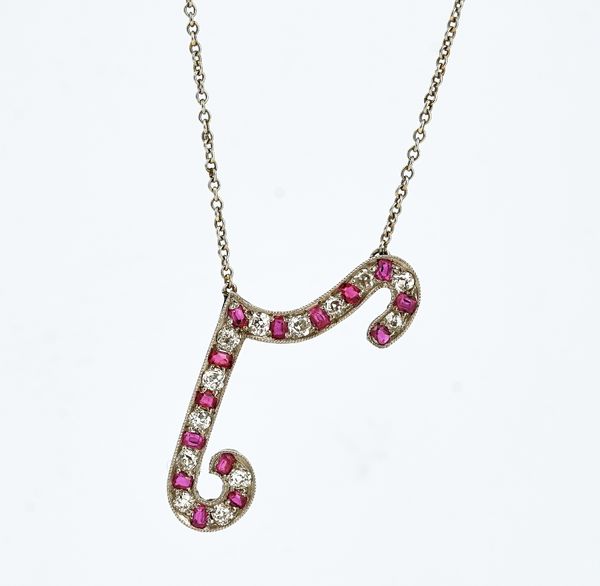A RUBY AND DIAMOND PENDANT NECKLACE