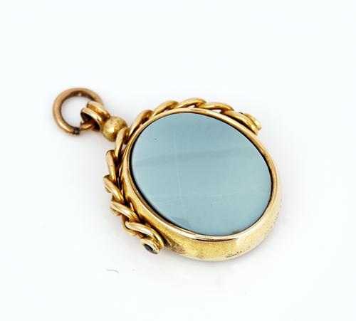 A Victorian 15ct gold mounted bloodstone and sardonyx oval rotating fob seal