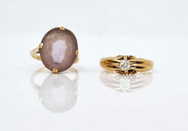 An 18ct gold single stone diamond ring and an amethyst dress ring (2)