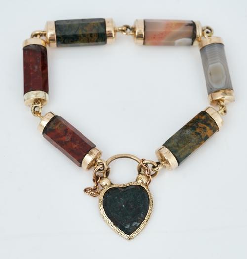 A gold mounted varicoloured agate bracelet