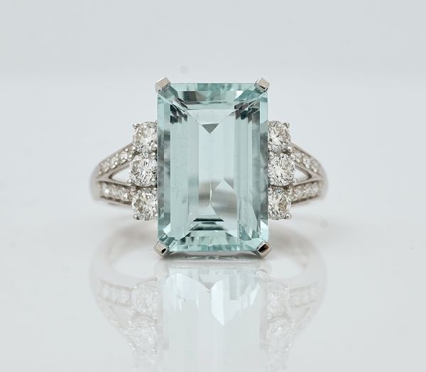 An 18ct white gold, aquamarine and diamond set ring