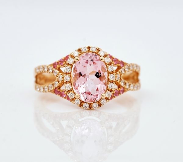 An 18ct rose gold morganite and diamond cluster ring