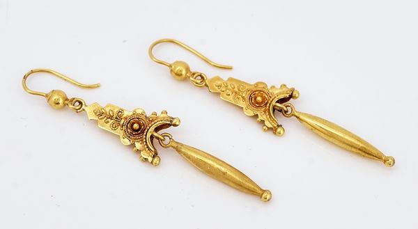 A pair of gold pendant earrings