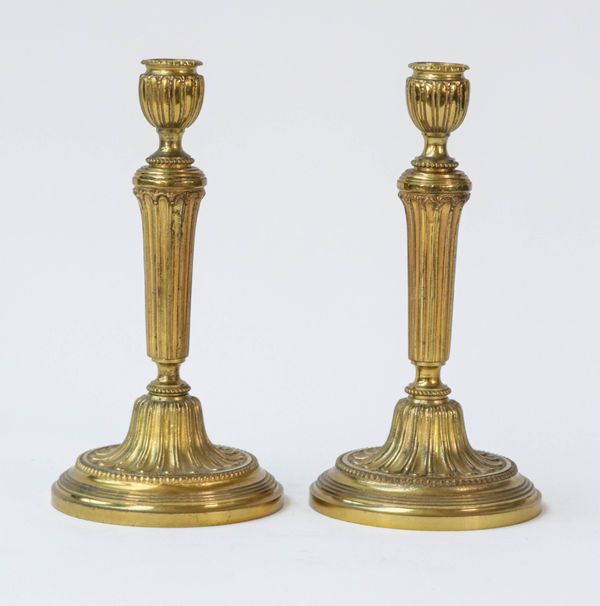 A pair of gilt-bronze candlesticks