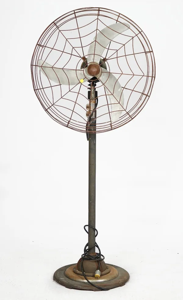 A large floor standing electrical fan