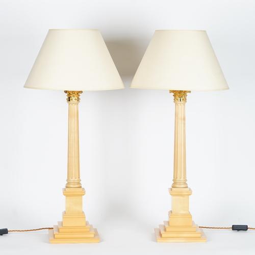 A pair of sycamore Corinthian column table lamps