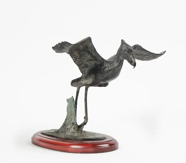 A patinated bronze model of a stork