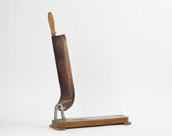 A French fruitwood and steel baguette chopper