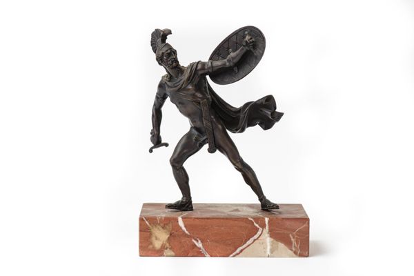 A bronze figure of a gladiator