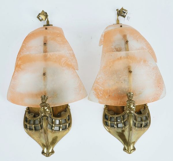 A pair of brass and etched glass nautical wall lights