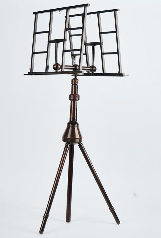 A portable Wheeldon’s Patent stained beech duet music stand