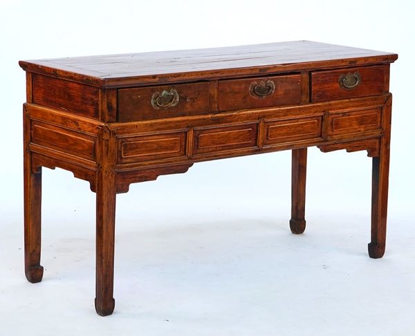 A Chinese hardwood three drawer serving table