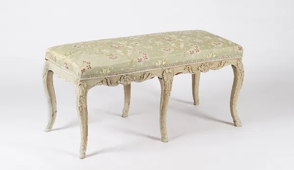 A FRENCH LOUIS XV STYLE CREAM-PAINTED STOOL