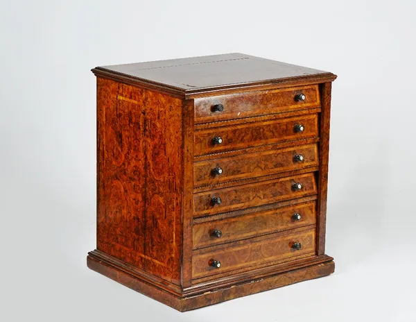 An Edwardian walnut six drawer folio cabinet