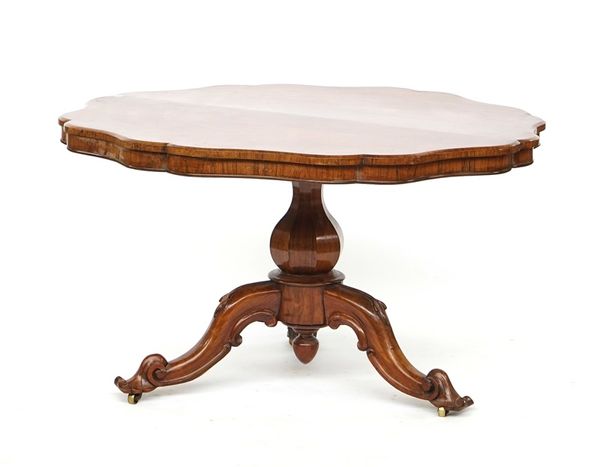 A rosewood centre table