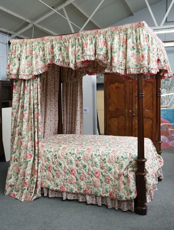 A George III style mahogany four poster double bed