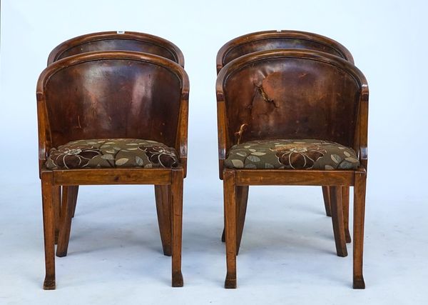 A set of four stained beech tub back chairs