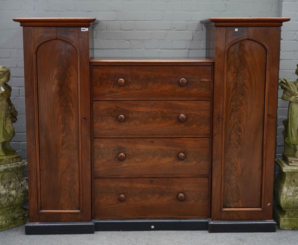 A VICTORIAN MAHOGANY SENTRY/COMPACTUM WARDROBE