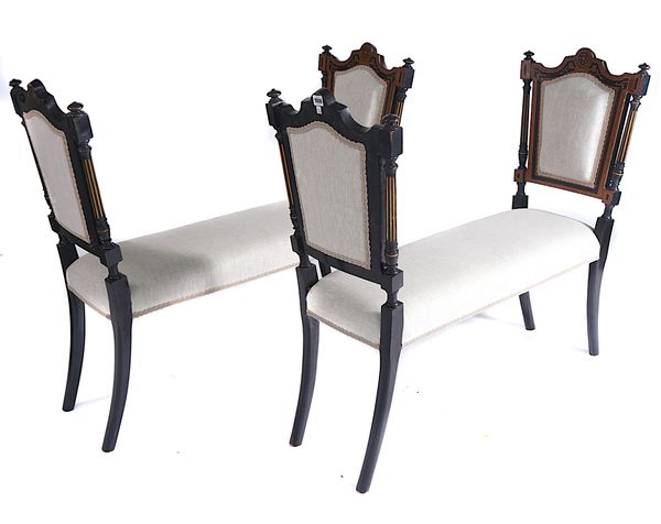 A PAIR OF AESTHETIC MOVEMENT BURR WALNUT AND EBONISED WINDOW SEATS (2)