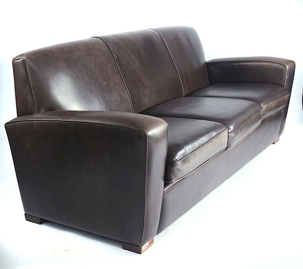 A MODERN TAN LEATHER UPHOLSTERED THREE SEAT SOFA