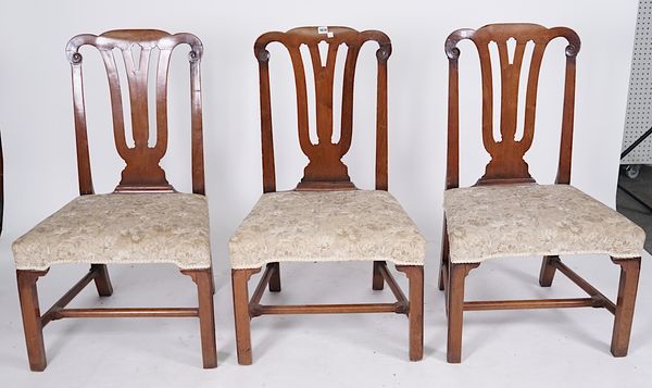 A SET OF THREE IRISH MAHOGANY PIERCED SPLAT BACK SIDE CHAIRS