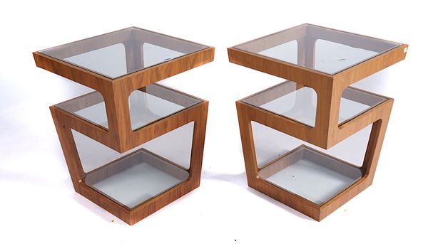 A PAIR OF MODERN DESIGN WALNUT AND GLASS SQUARE THREE TIER OCCASIONAL TABLES (2)