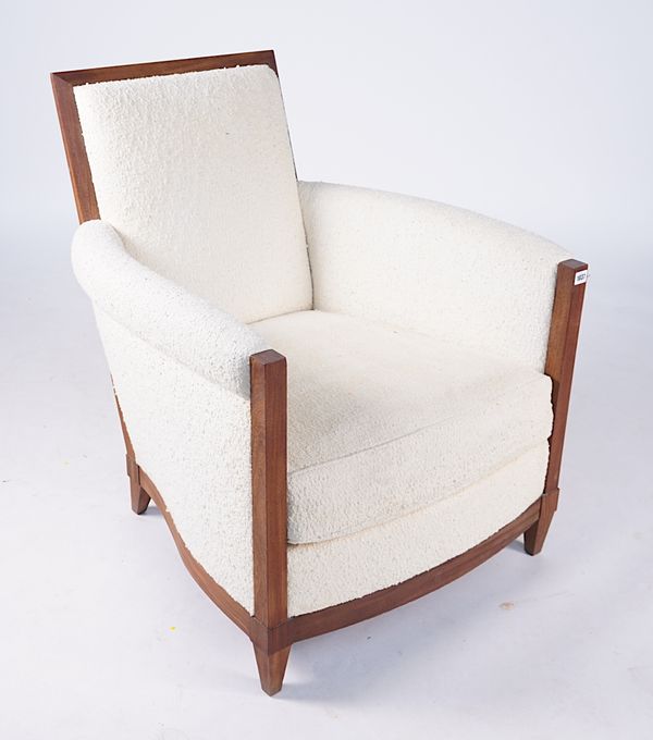 DONGHIA; A TEXTURED CREAM UPHOLSTERED HARDWOOD FRAMED EASY ARMCHAIR