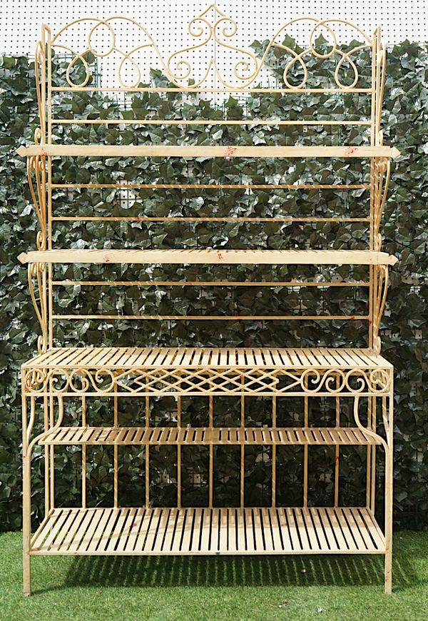 A FRENCH STYLE CREAM PAINTED WROUGHT IRON SIX TIER BAKER’S RACK