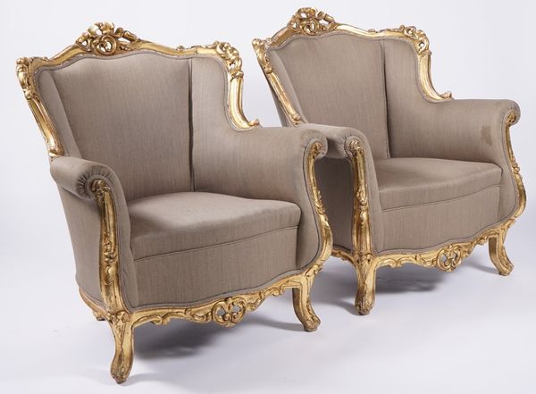 A PAIR OF LOUIS XV STYLE GILT FRAMED TUB BACK ARMCHAIRS (2)