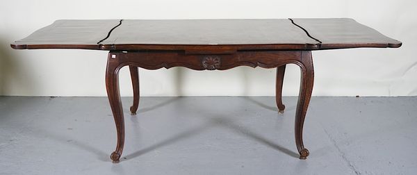 A LATE 19TH CENTURY FRENCH PARQUETRY VENEERED DRAWLEAF DINING TABLE