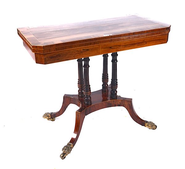 A GEORGE IV ROSEWOOD FOLD-OVER GAMES TABLE