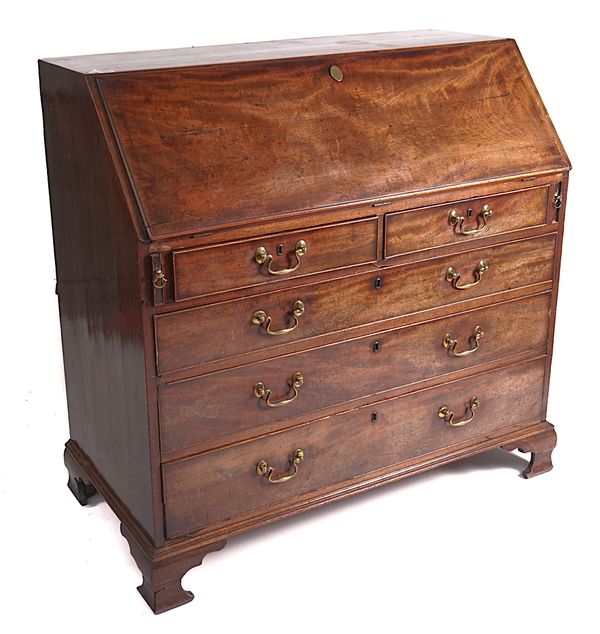 A MID-18TH CENTURY MAHOGANY BUREAU OF LARGE PROPORTIONS